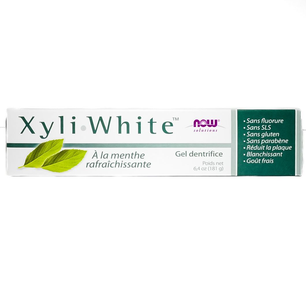 XyliWhite toothpaste box in white and green packaging with mint leaves.