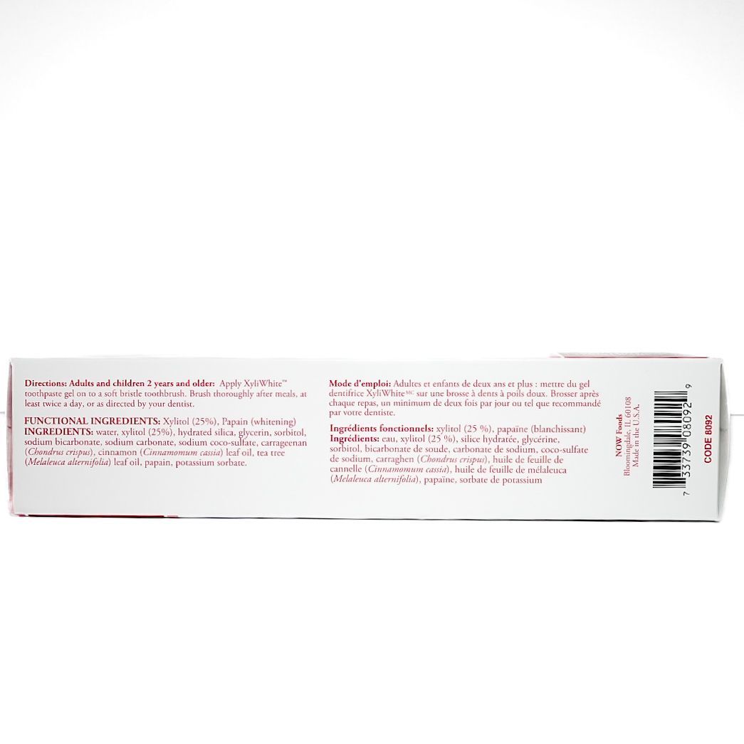XyliWhite toothpaste box with red and white packaging and cinnamon stick image
