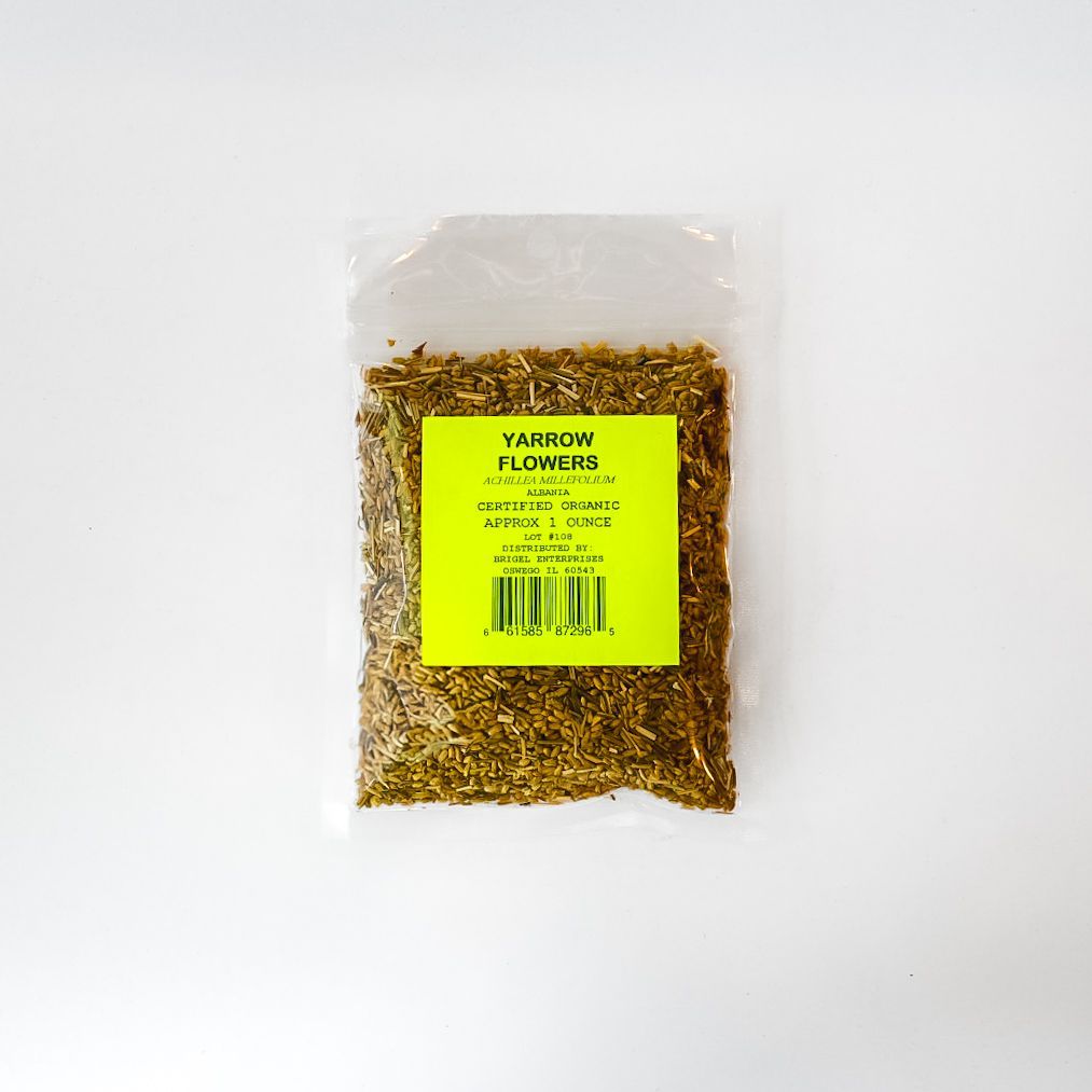 Clear plastic bag of dried yellow flowers with a bright yellow label on a white background