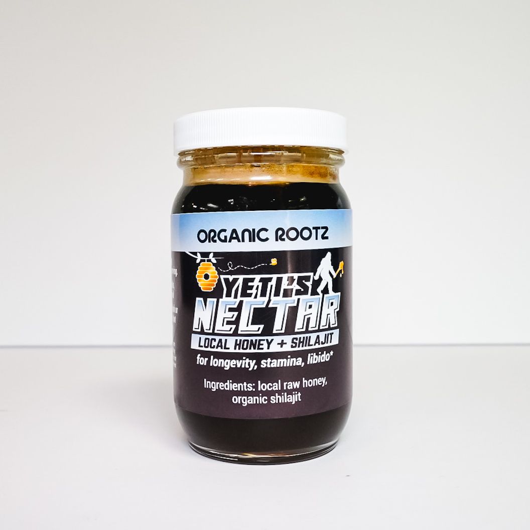 Jar of Organic Rootz Yeti’s Nectar syrup on a white background