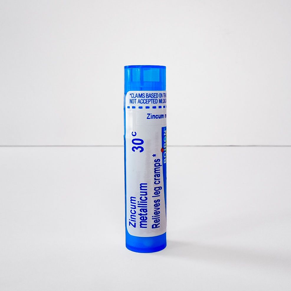 Blue lip balm tube standing upright on a white background.