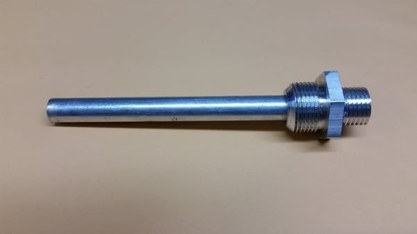 Metal threaded rod with a knurled nut and hex head on a beige background