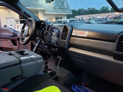 The interior of a ford super duty truck is shown.