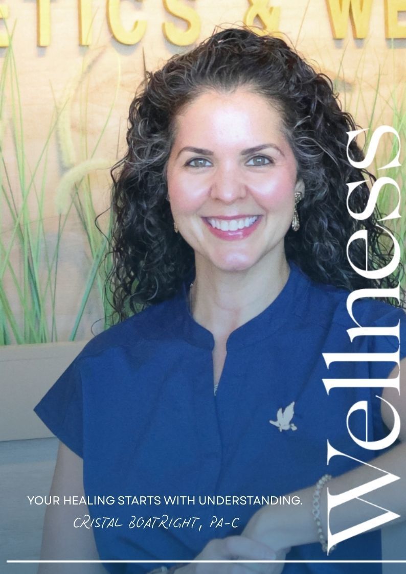 Smiling woman with curly dark hair in blue top against a gold and green backdrop