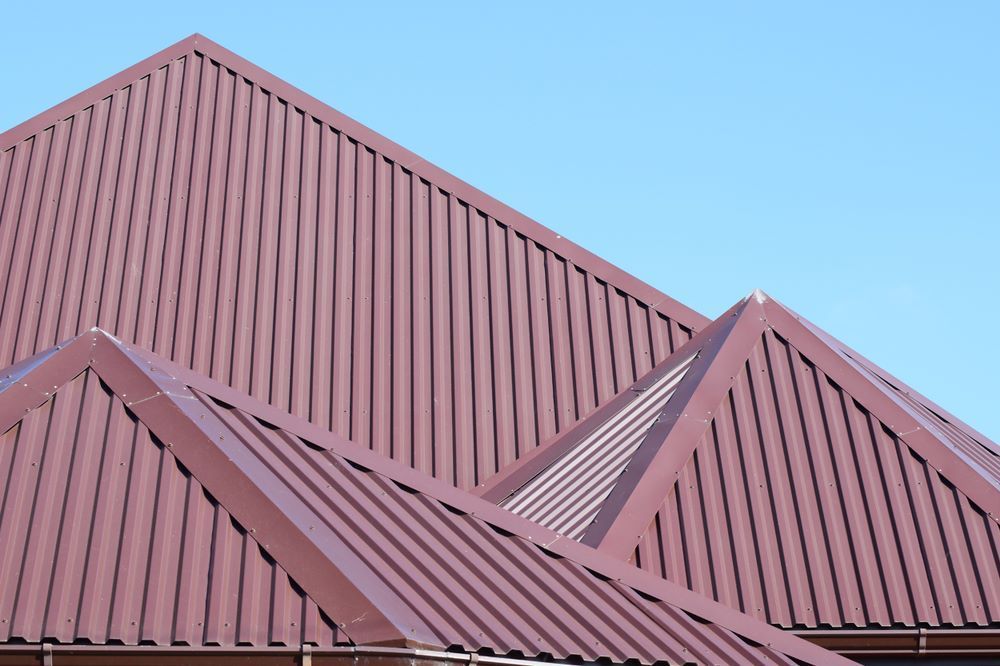 A Close Up of a Roof With a Blue Sky in the Background — Timms Roofing In Barrack Heights, NSW