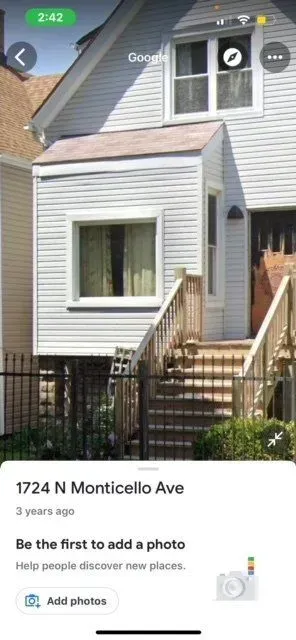 Exterior services Chicago IL Light blue house with steps, a small porch, and a fence. The address is 1724 N Monticello Ave.