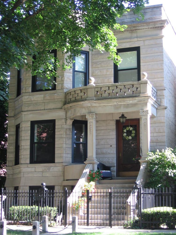 A house with a wreath on the front door