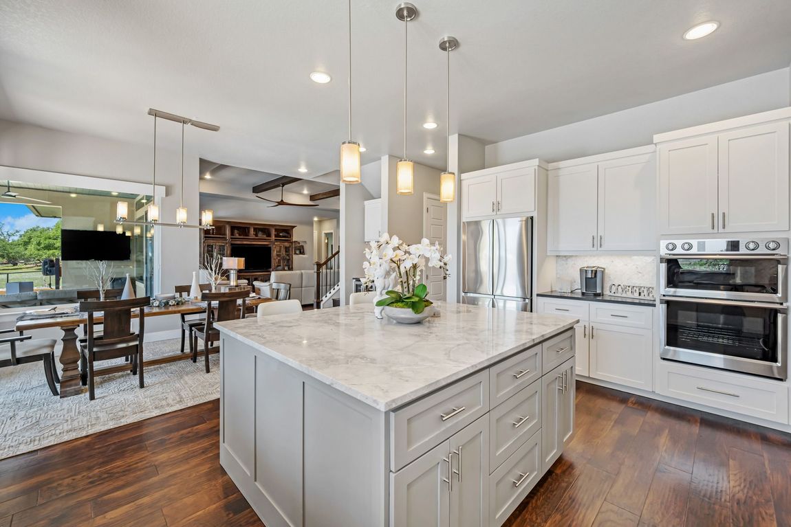 There is a large island in the middle of the kitchen