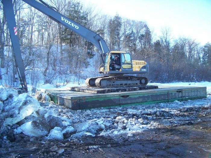2-11-2010 Moving ice so the barge can be positioned to work on the South end of the channel.