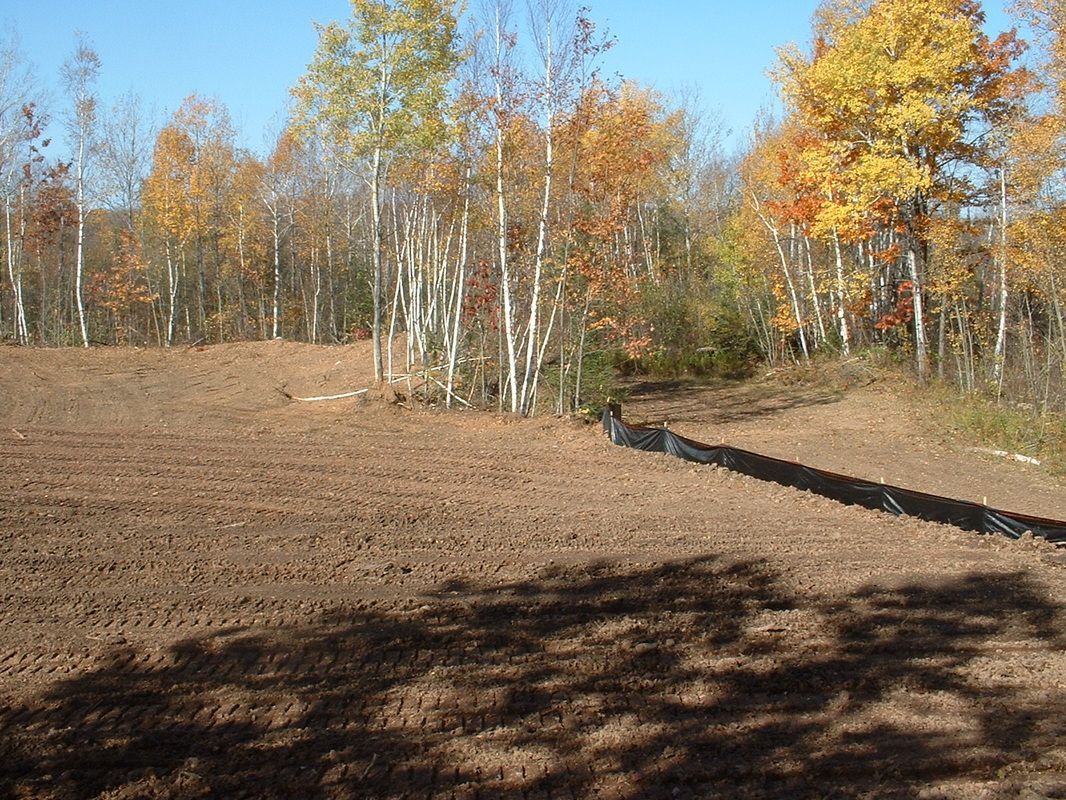 1-8-2010 The temporary holding pit has been reclaimed and reseeded.