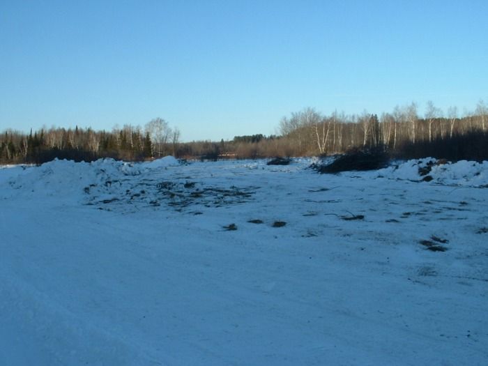 1-30-2010 preparation of the road accross the marsh from the channel north to the snowmoblie trail