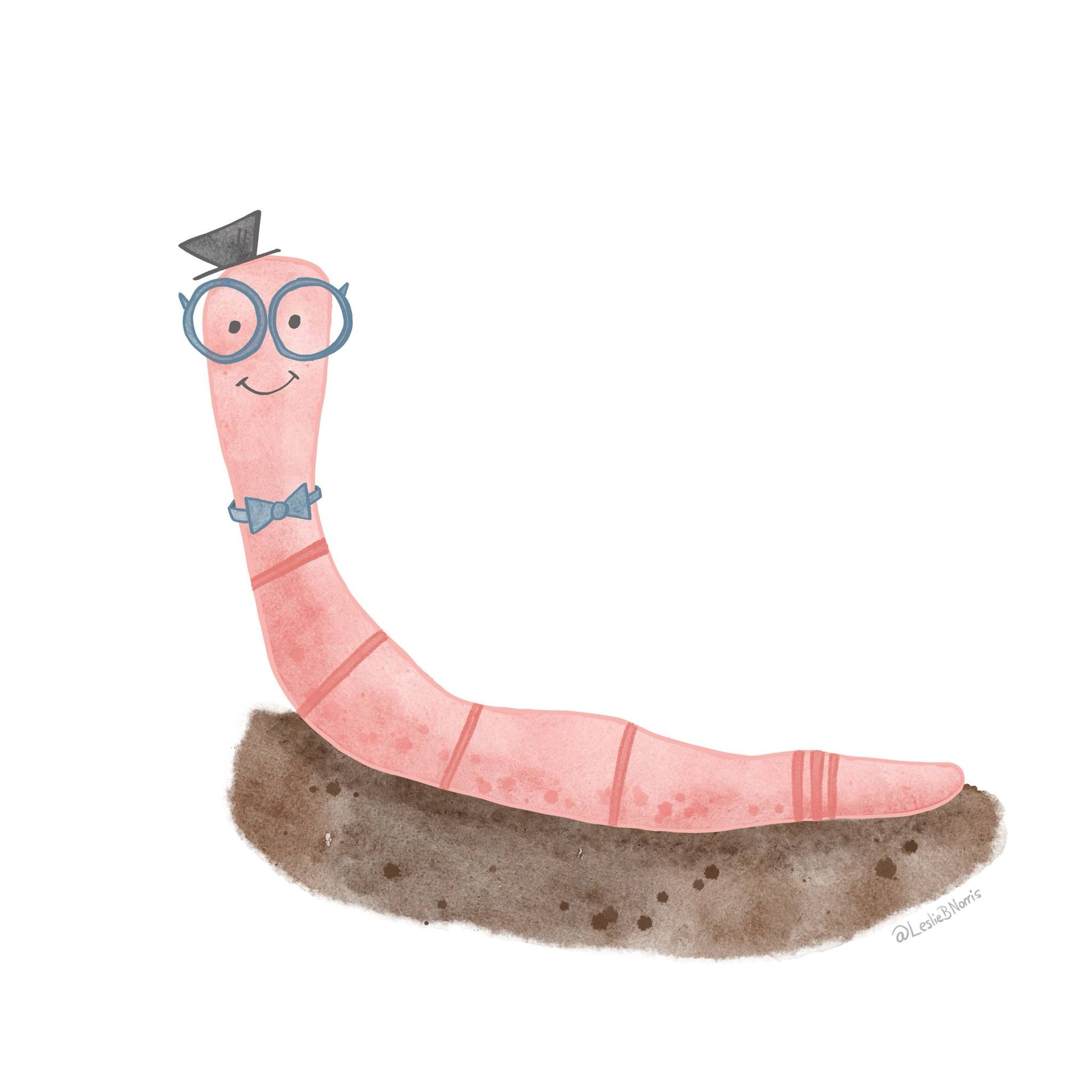 Cartoon pink worm wearing round glasses and a bow tie, sitting on a brown dirt mound.