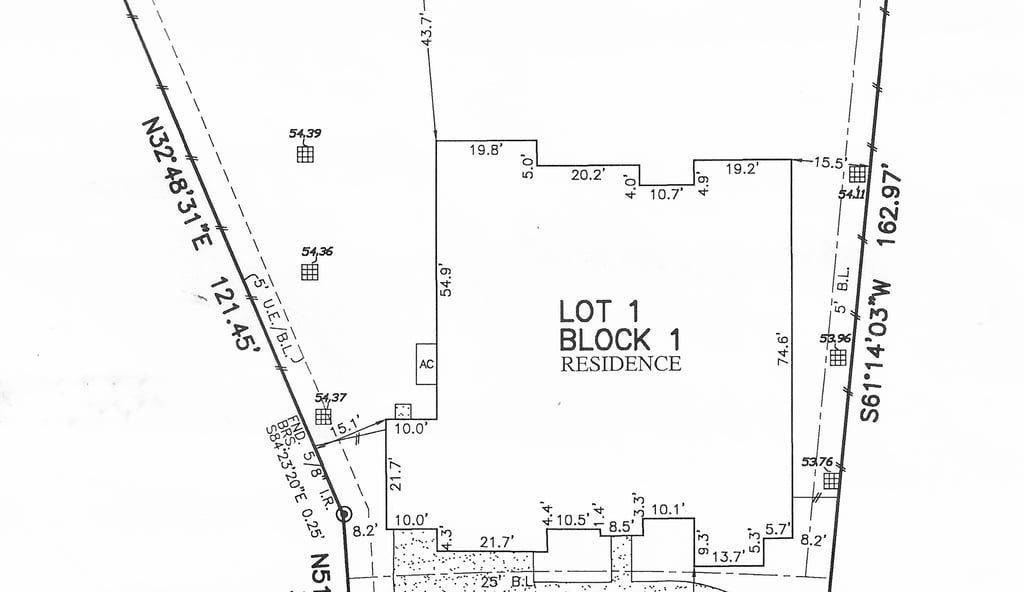 Property survey map showing lot boundaries and dimensions for Block 1, Lot 1.