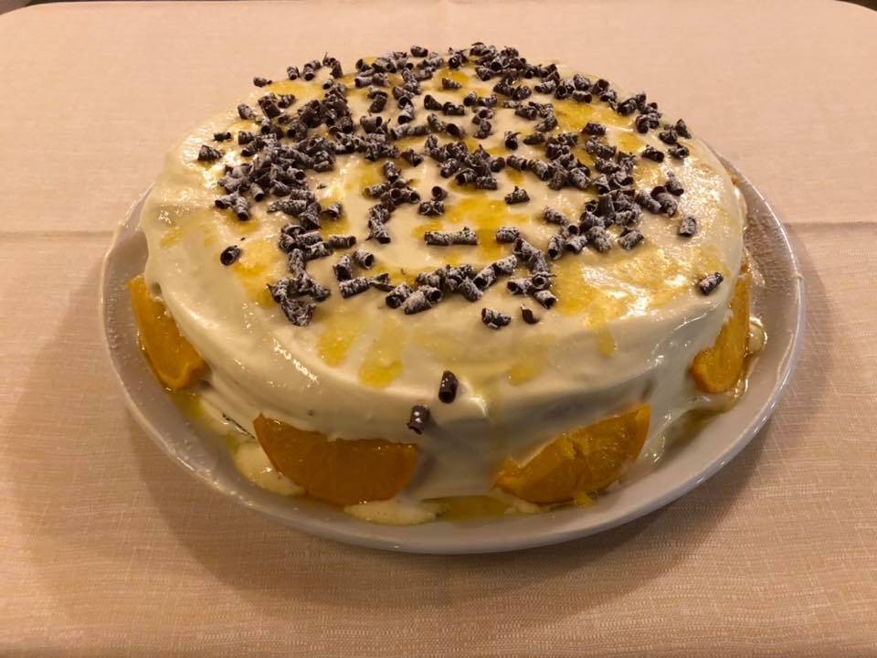 Dolce con confettura di arance amare e crema