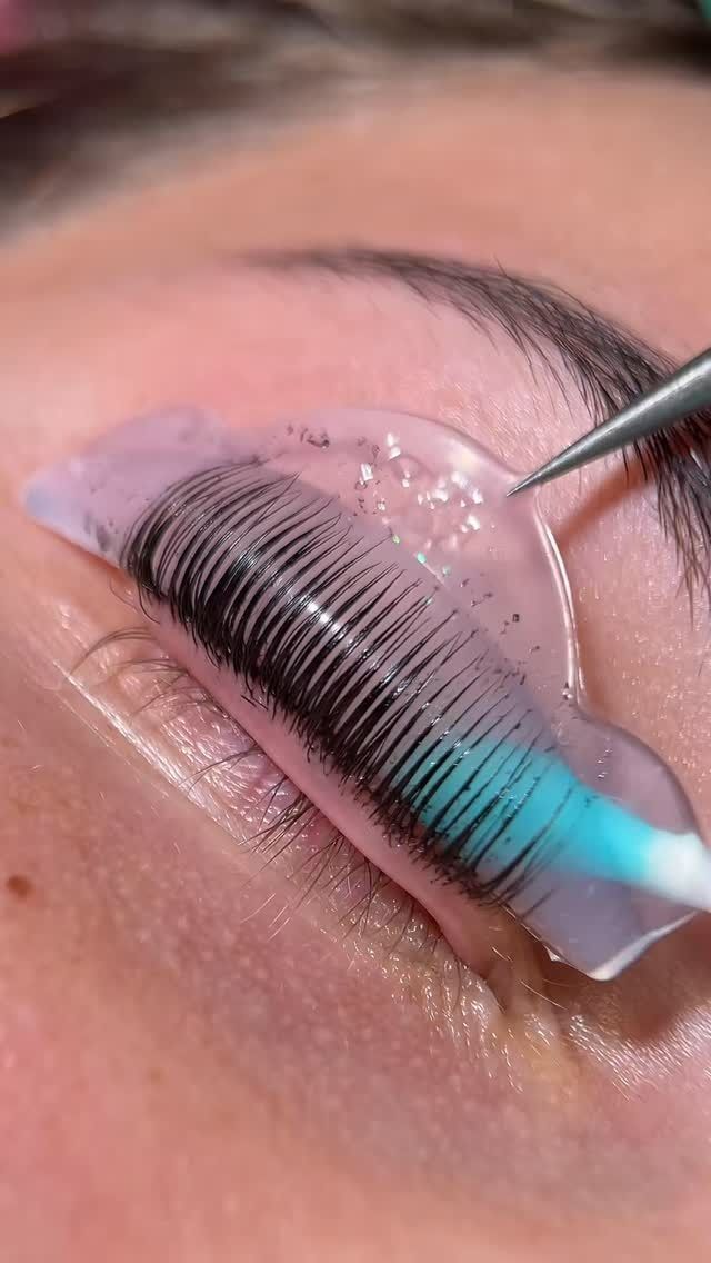 Eyelash Lift Procedure in Progress: Lashes Are Glued to a Silicone Pad — Sage Spa & Beauty in Mackay, QLD