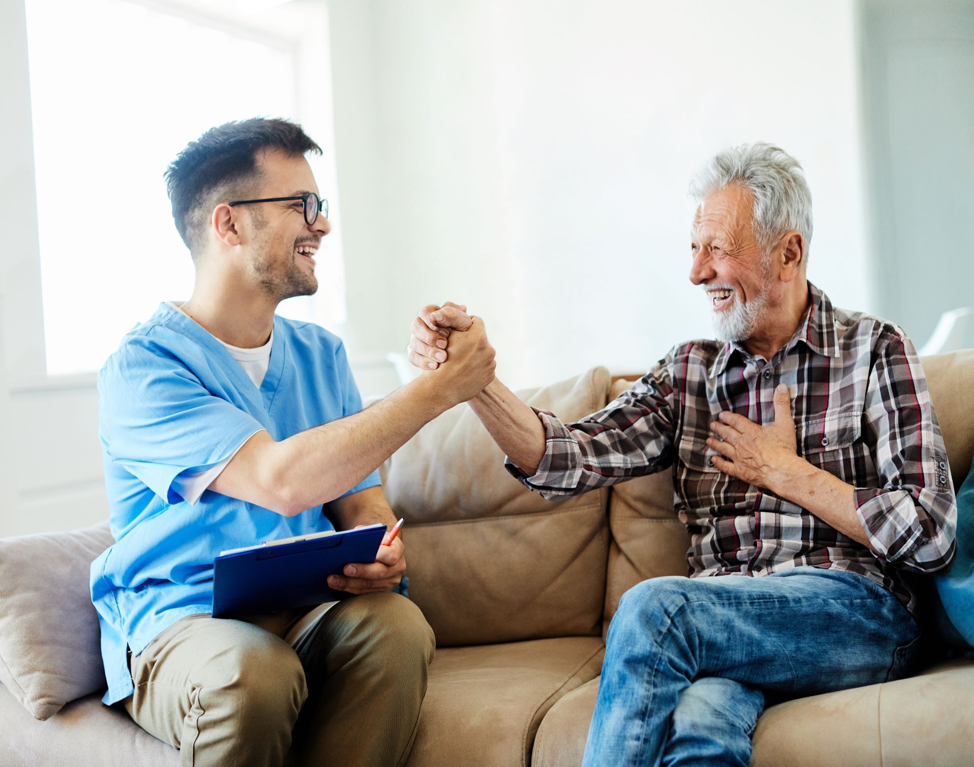 caregiver celebrating with patient
