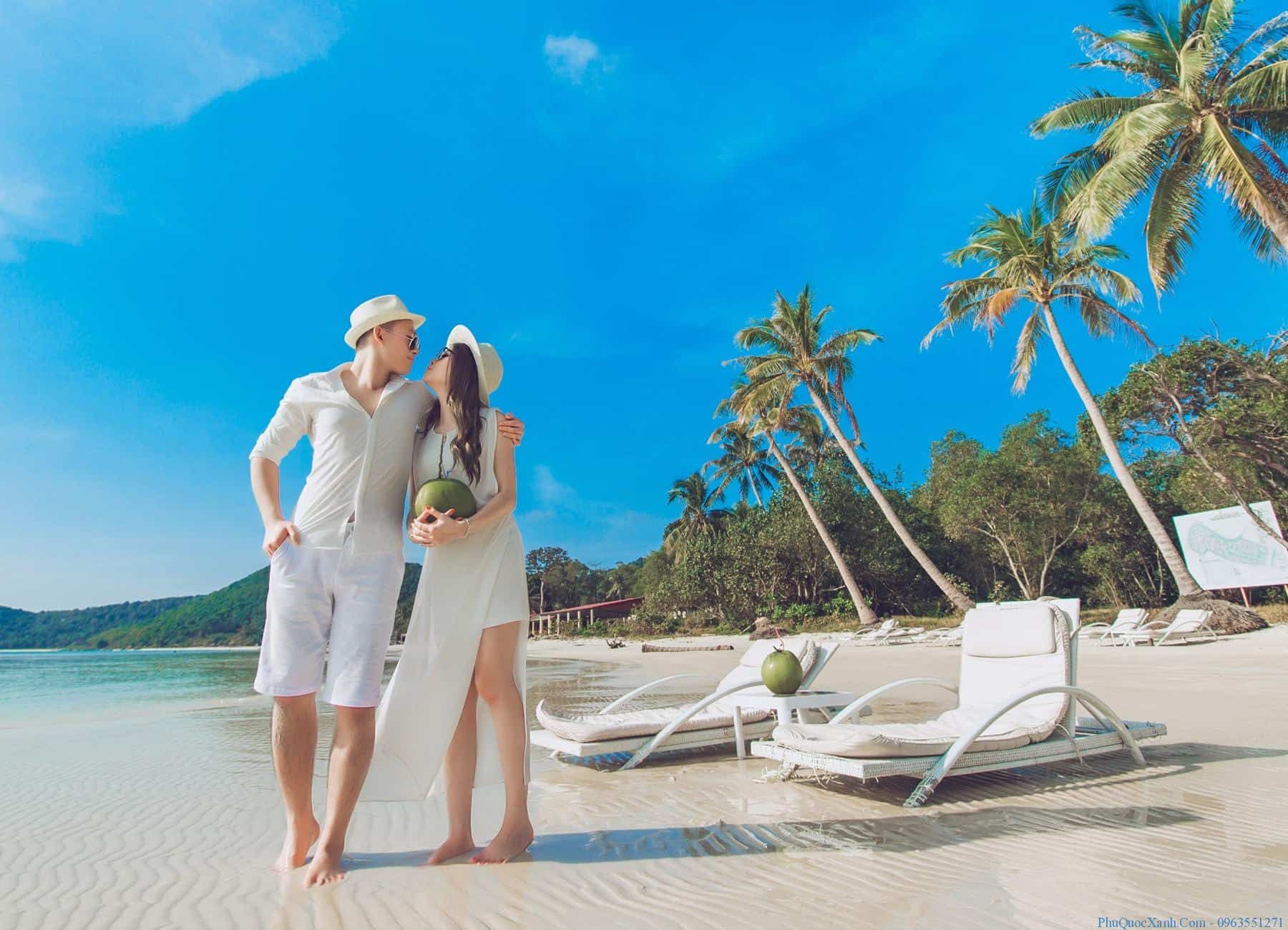 A couple enjoying a beachside retreat in Phu Quoc, Vietnam’s paradise for honeymooners.