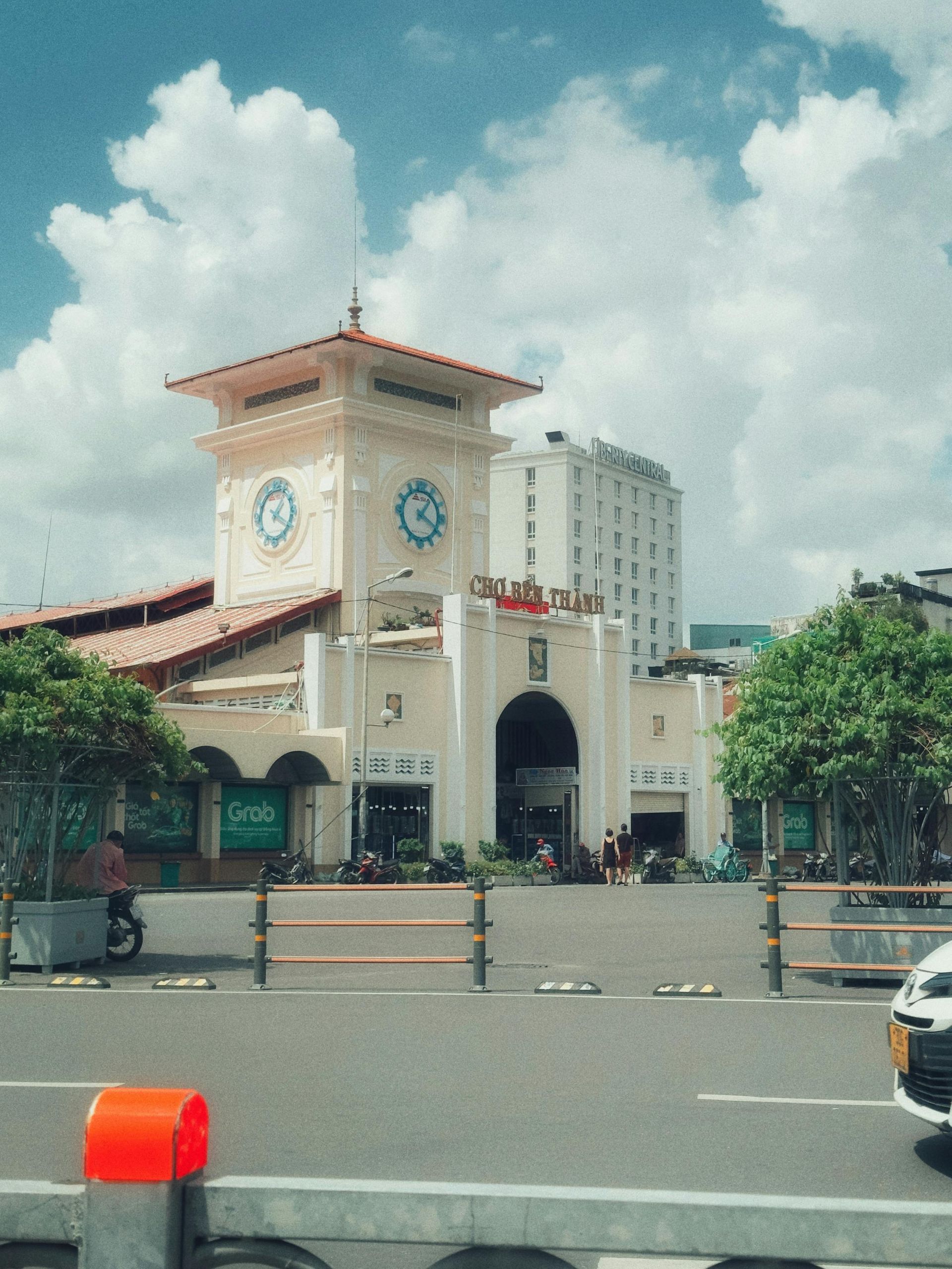 Ben Thanh Market in Ho Chi Minh City, bustling with vendors and shoppers.