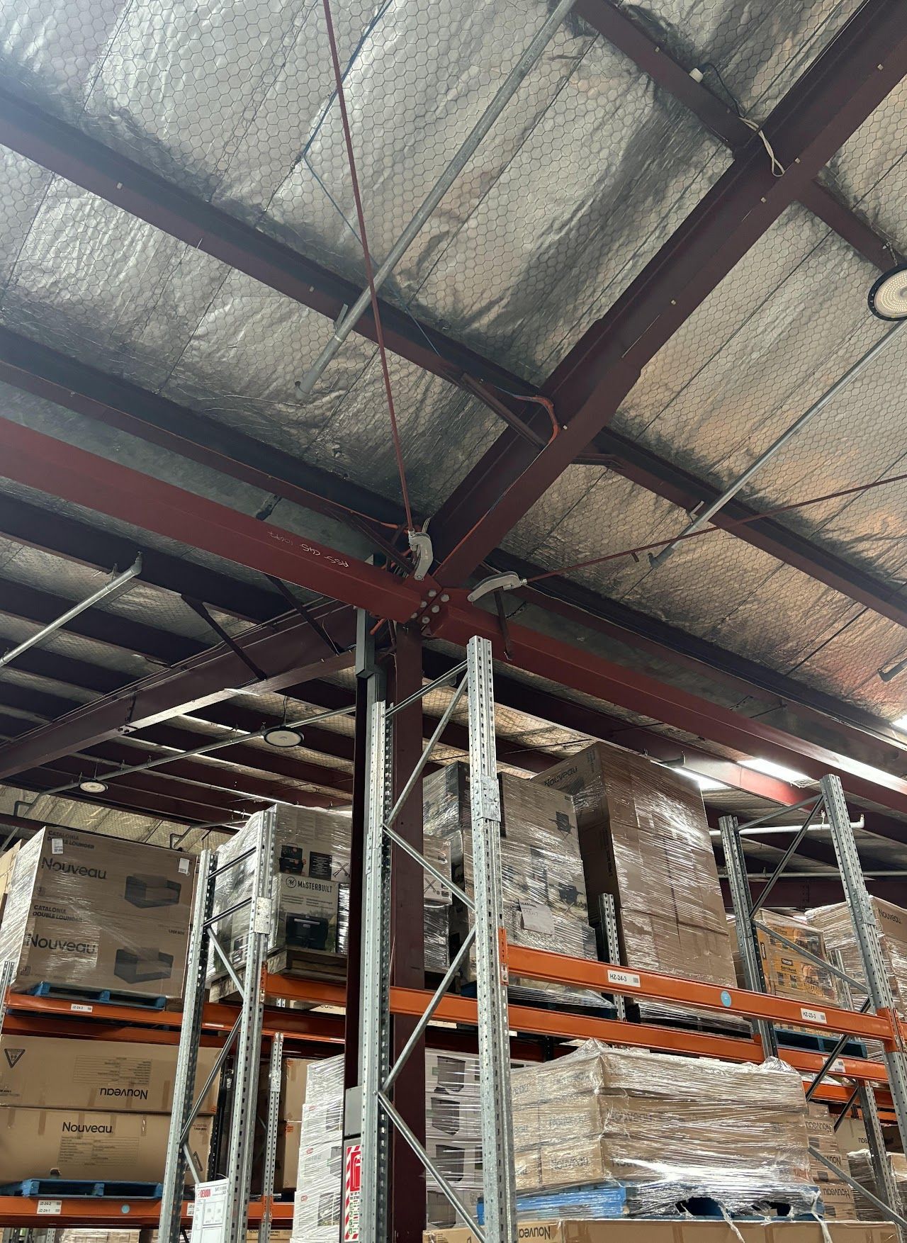 A warehouse filled with lots of shelves and boxes.