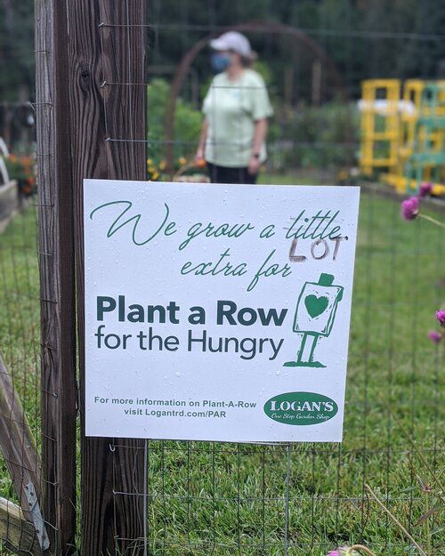 Par Sign With Some Minor Changes “We Grow A Lot For Plant A Row For The Hungry”.