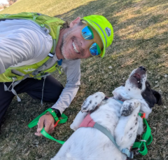 Emma taking a selfie with a  dog