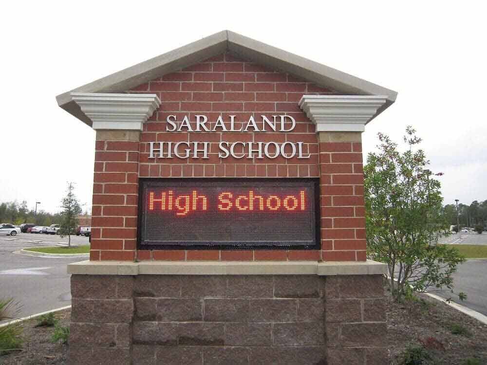 A brick monument sign reading 