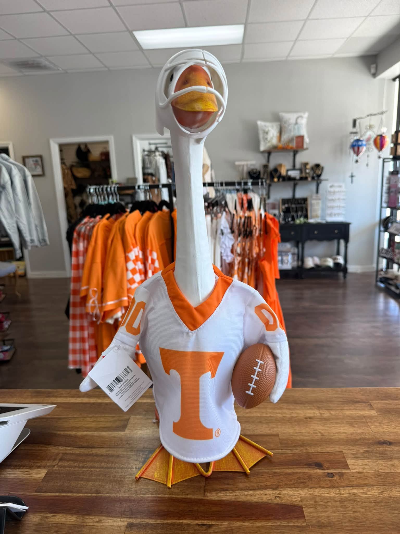 White inflatable swan with orange 