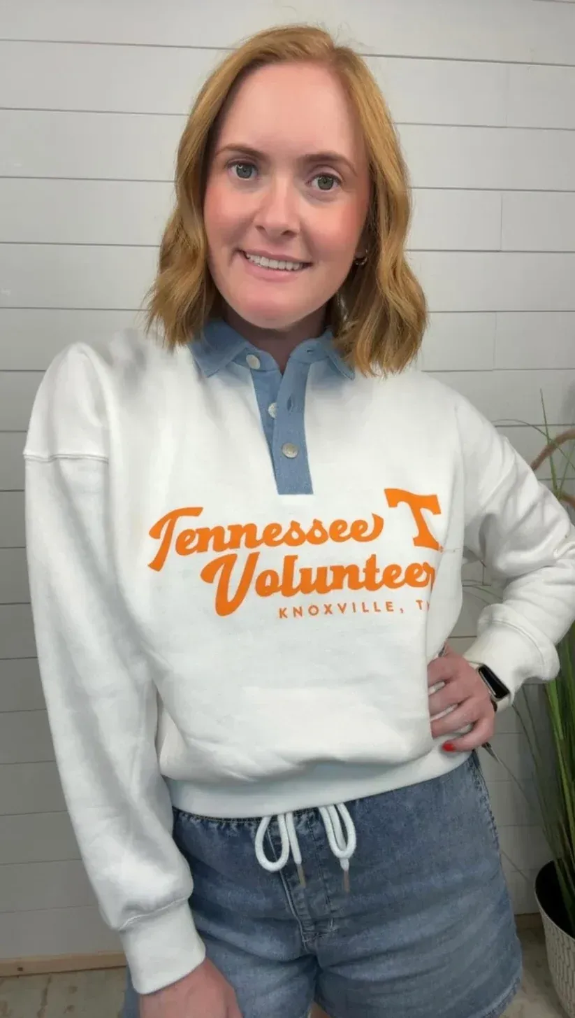 Tennessee and UT Vols merchandise display on a wood shelf