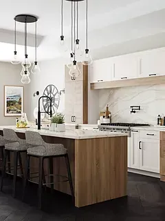 A kitchen with a large island , stools , a stove and a sink.
