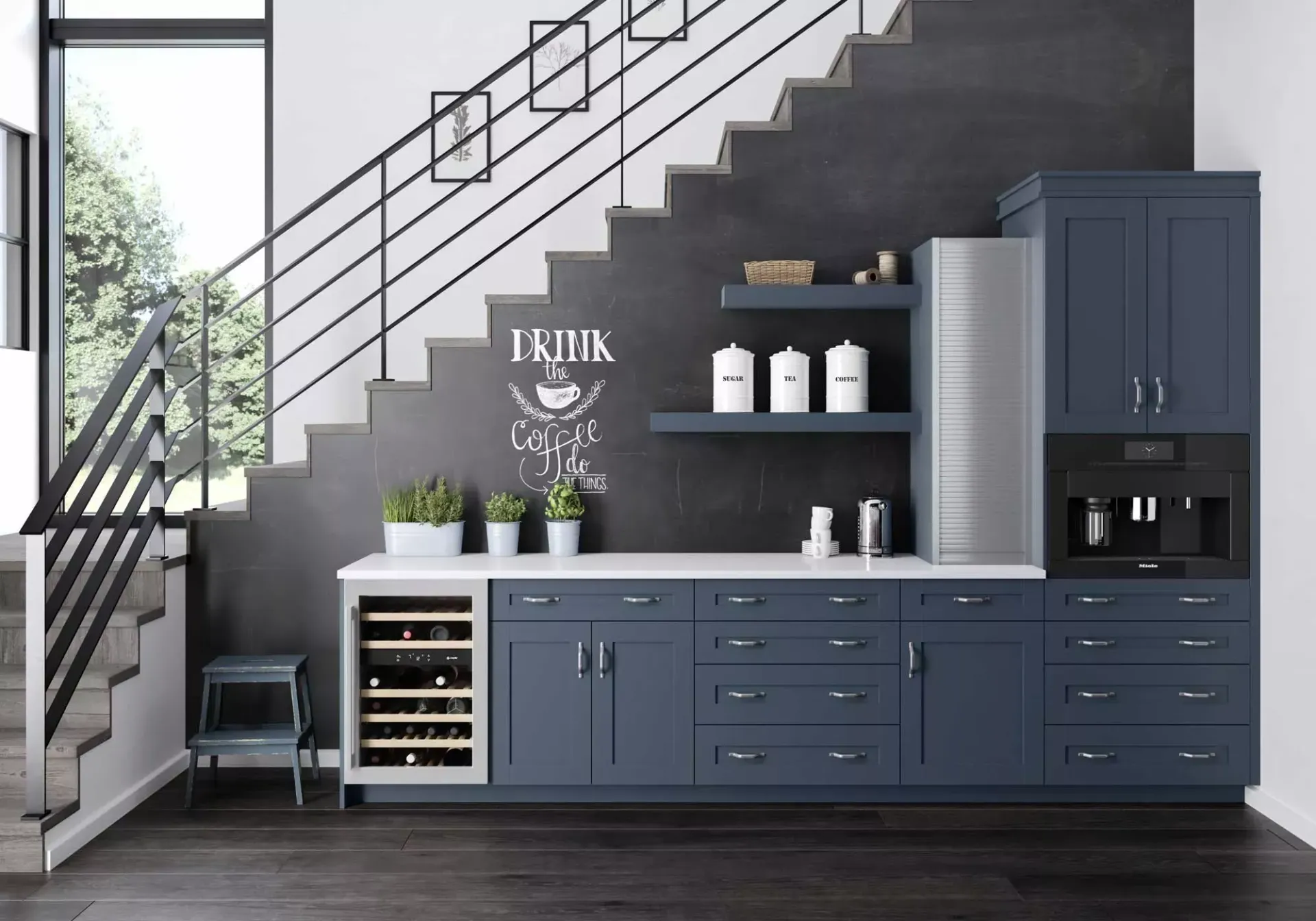A kitchen with blue cabinets and a wine cooler under the stairs.