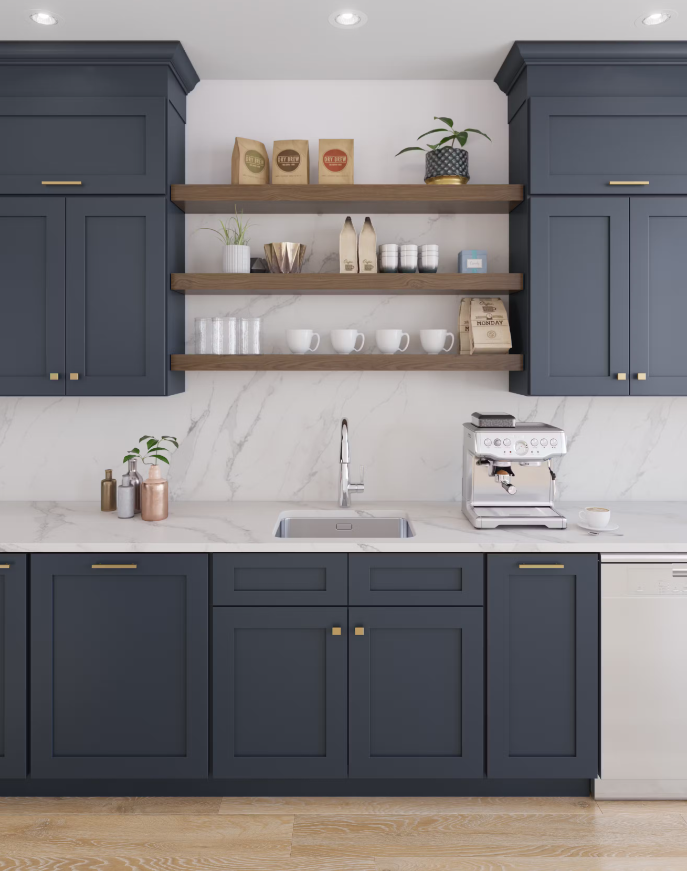 A kitchen with blue cabinets and white counter tops