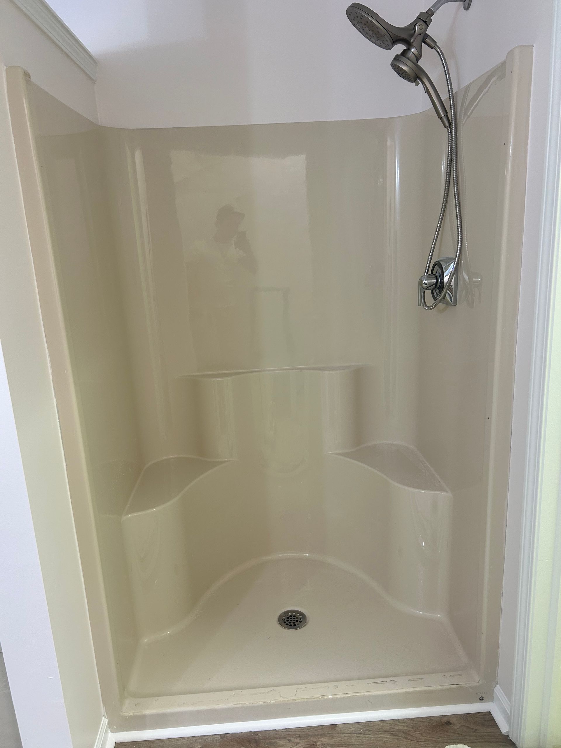 Here you can see a picture of a dull  shower that seems to have had its best years of its life. If you want to transform a dull shower into its  original, clean state, call Ohio tub pros for a shower refinishing job.