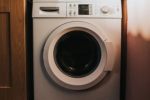 White Washing Machine in Utility Room — South River, NJ — All Brands Appliance White Washing Machine in Utility Room — South River, NJ — All Brands Appliance