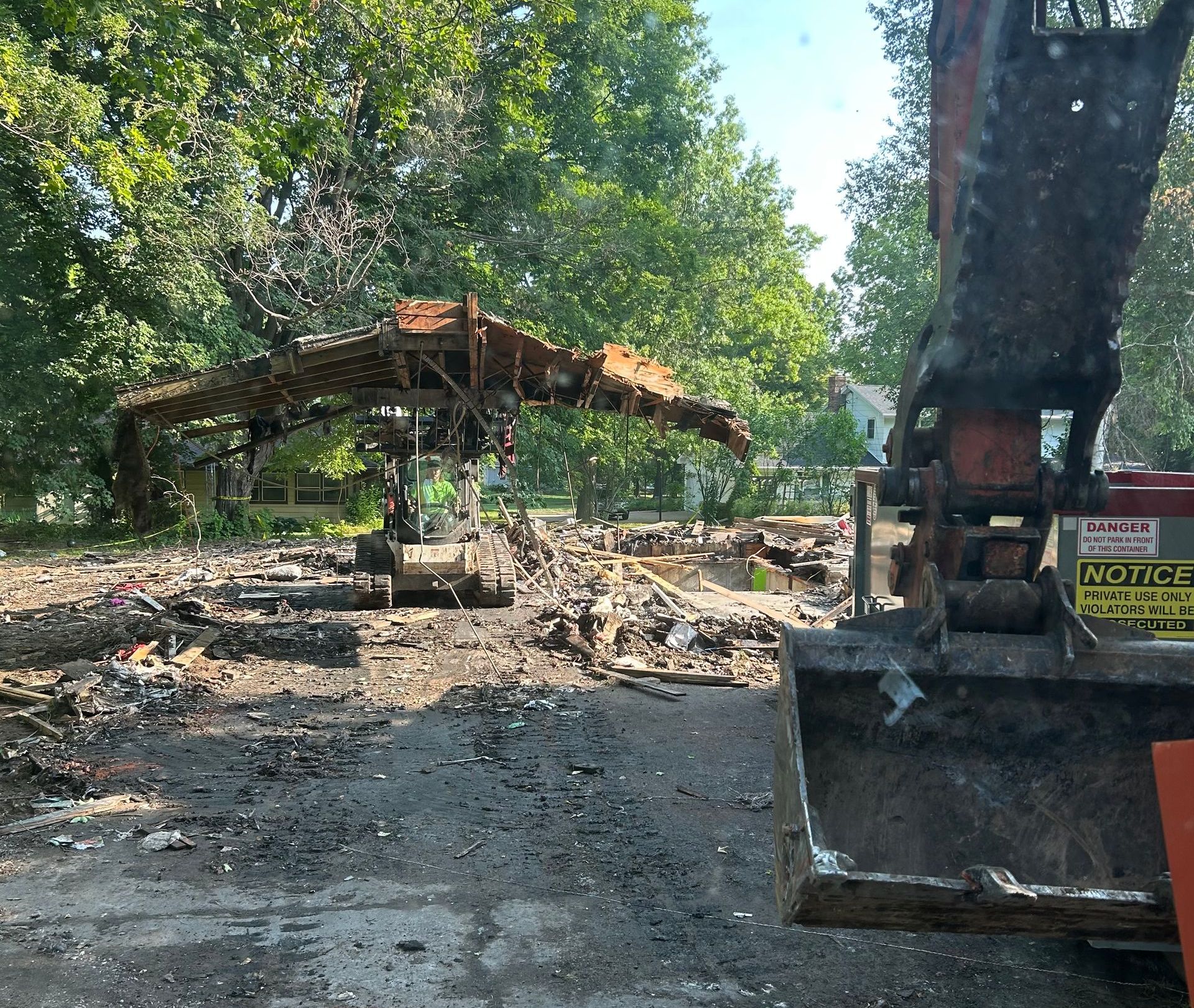 A large excavator is working on a construction site.