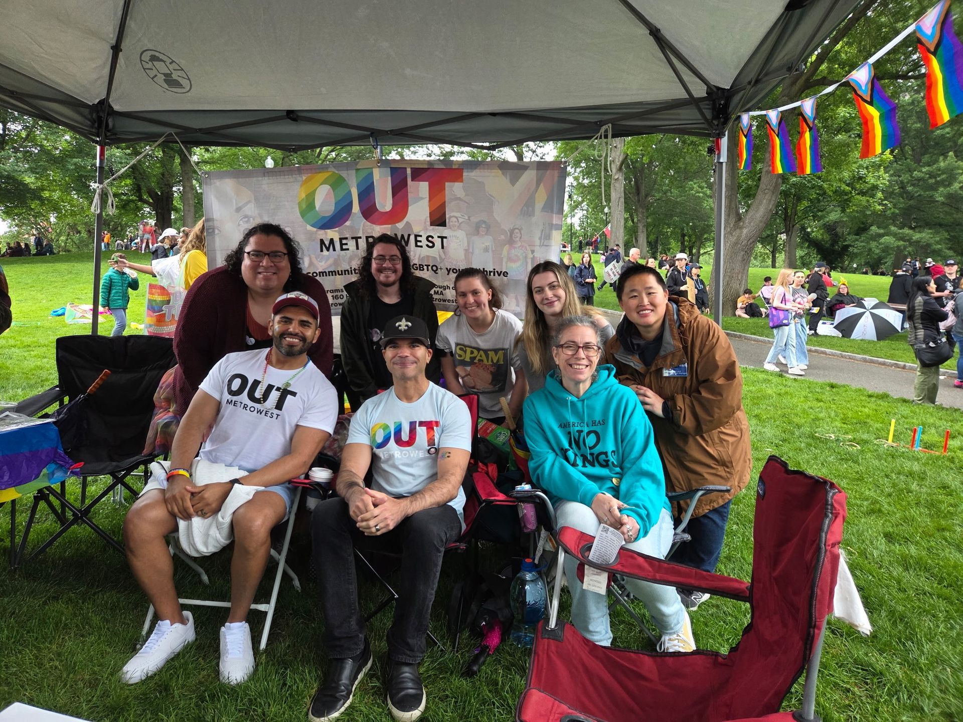 Group of people under a tent with