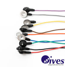 Earbuds with different colored wires, grouped together on a white surface.