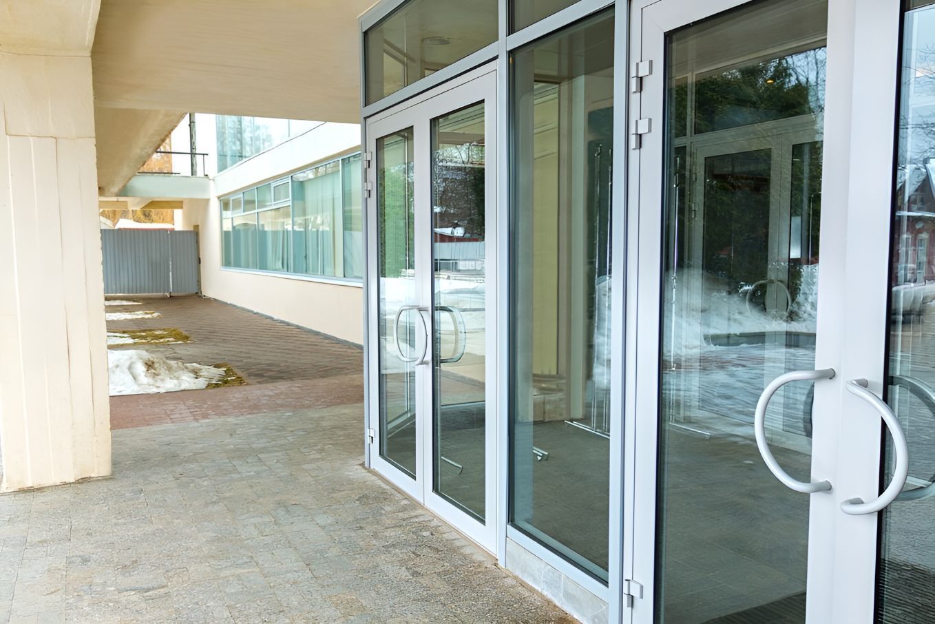 A Building With a Lot of Glass Doors and Windows — Twin Cities Glass In Wodonga, NSW
