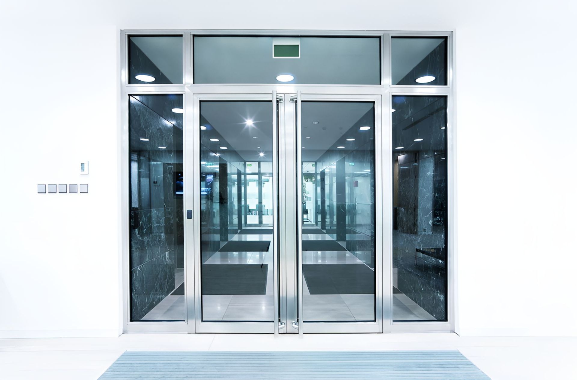A Large Glass Door in a Building With a Lot of Windows — Twin Cities Glass In Albury, NSW