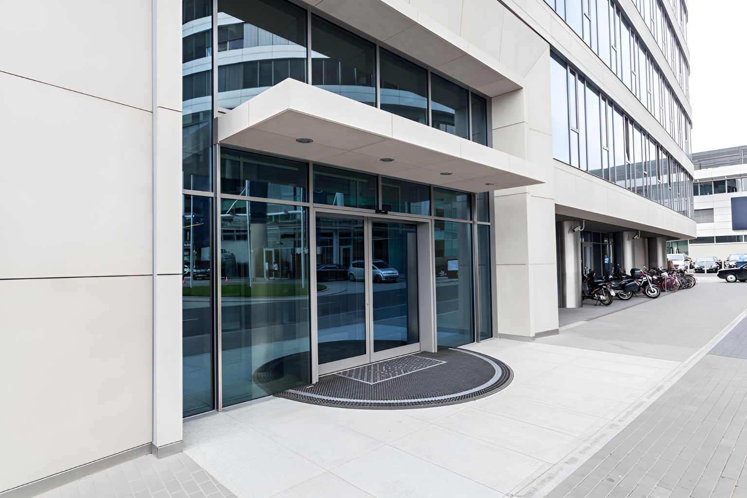 A Large Building With a Lot of Windows and a Doorway — Twin Cities Glass In Albury, NSW