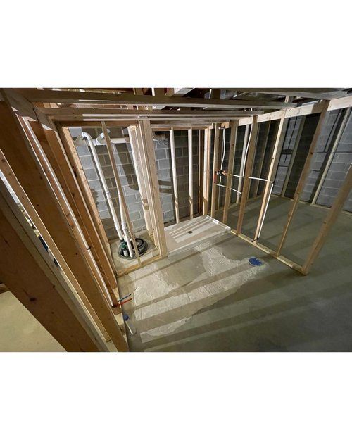 A room is being built in a house with wooden walls.