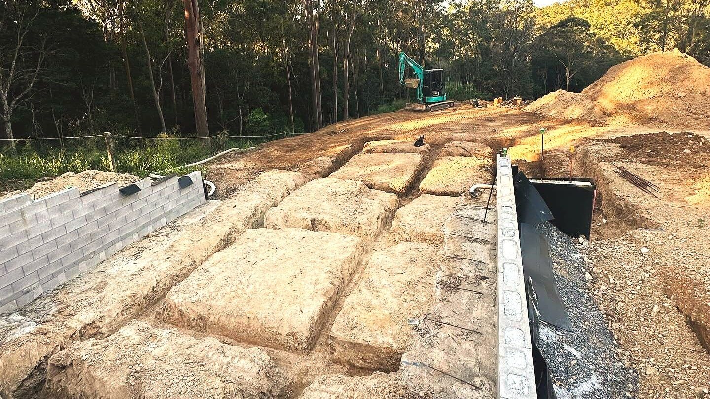 Excavator completing bulk earthworks and material movement