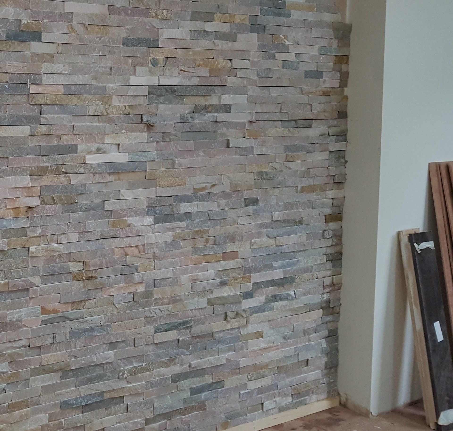 grey textured tiled feature wall