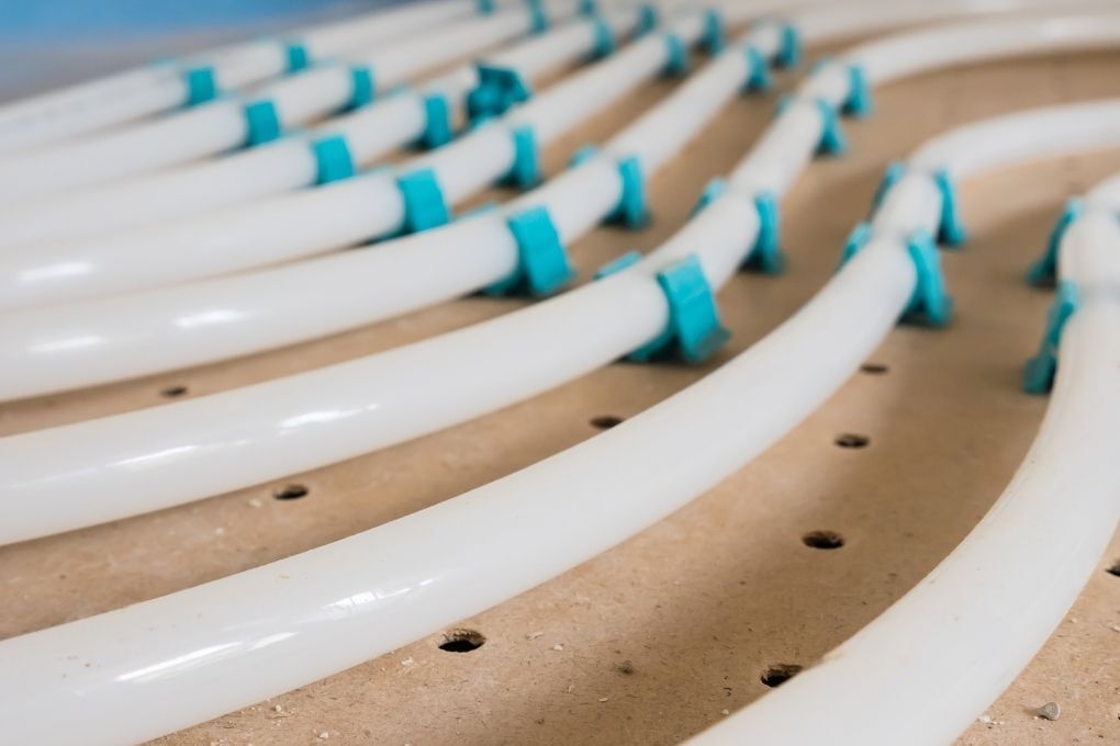 run of water underfloor heating pipes