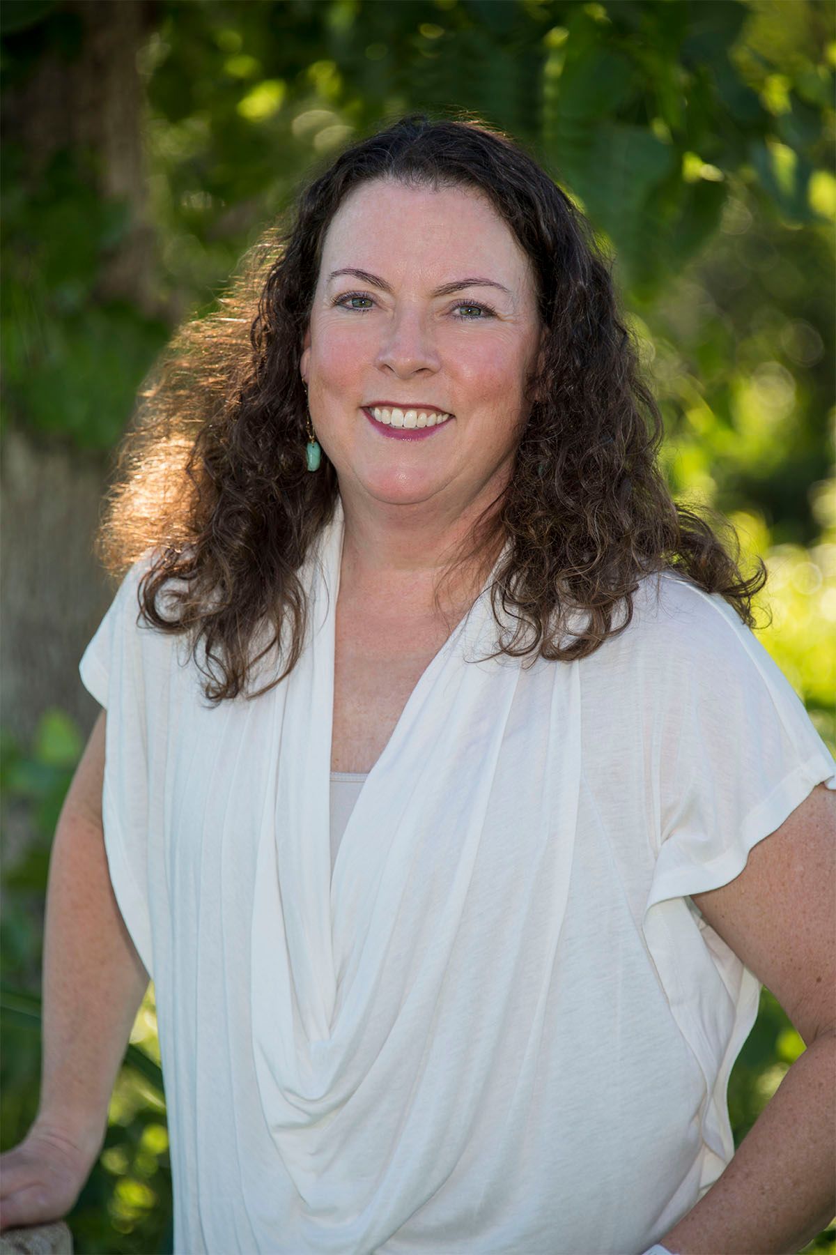 Carey Erff enjoying a quiet moment with her furry friend – where real estate meets real life. Carey Erff, Licensed Realtor and Property Management Specialist in DFW, Texas