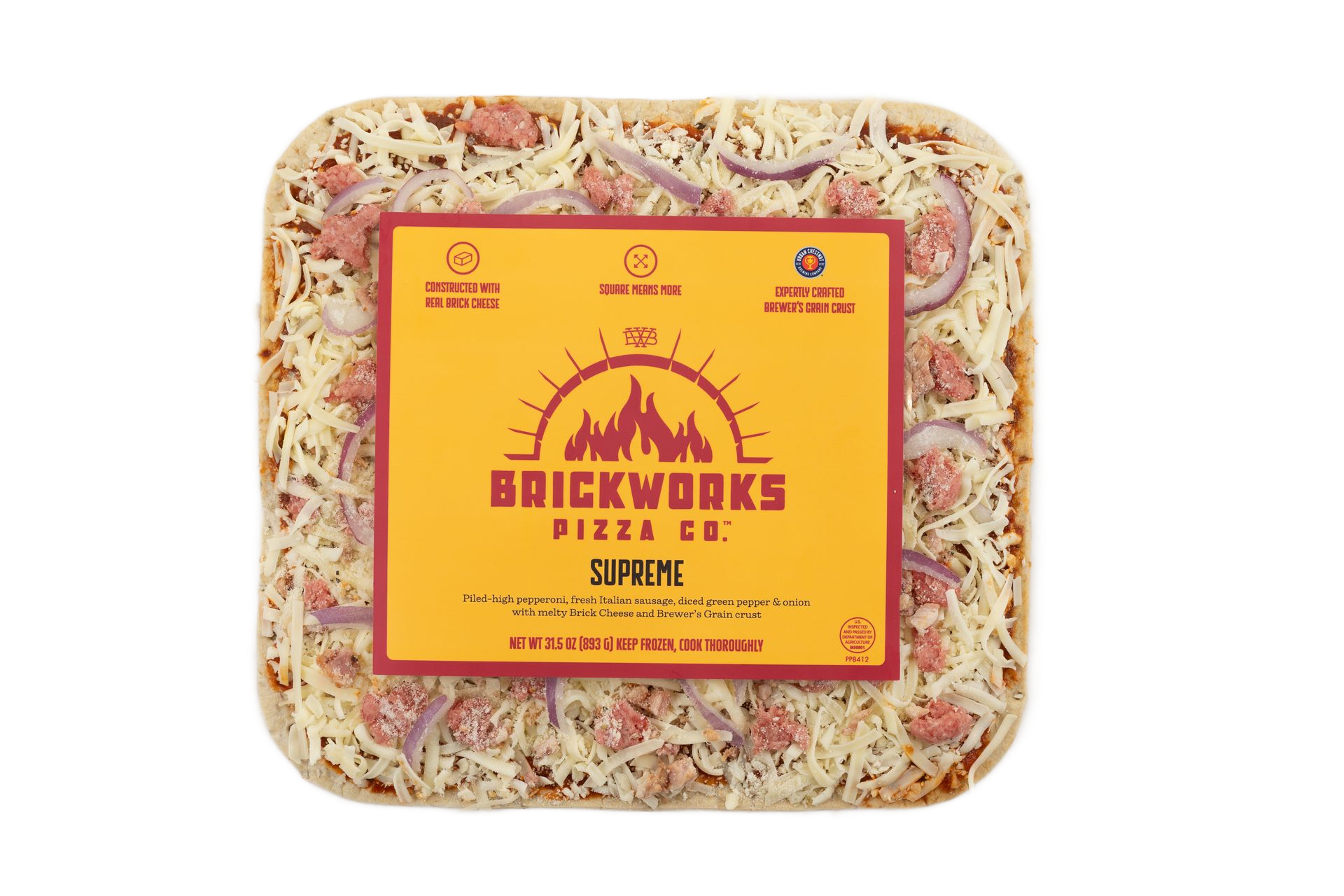 Square frozen cheese pizza in clear packaging with a yellow Brickworks Pizza label.