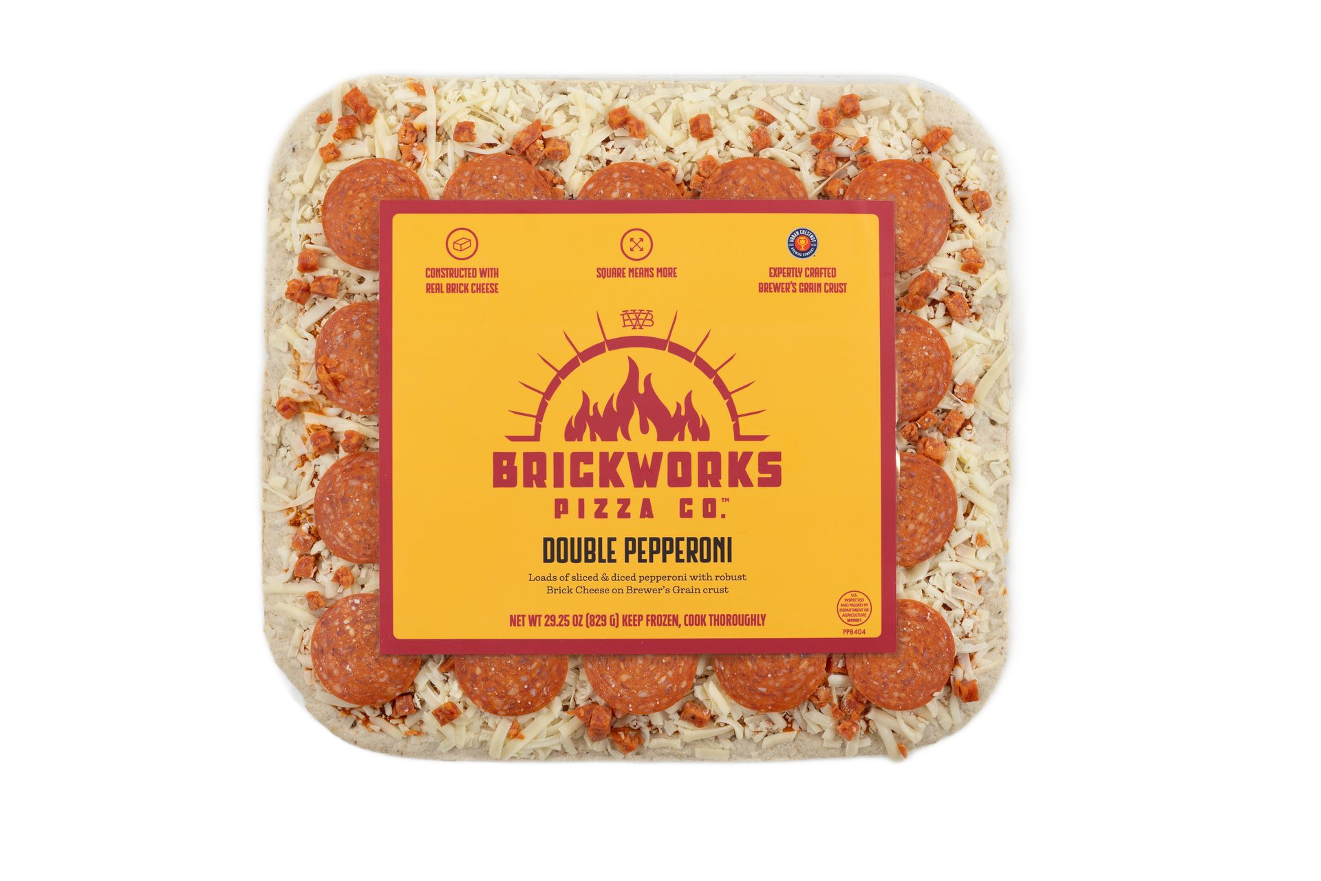 Brickworks pizza co. double pepperoni pizza in a clear square tray with yellow label