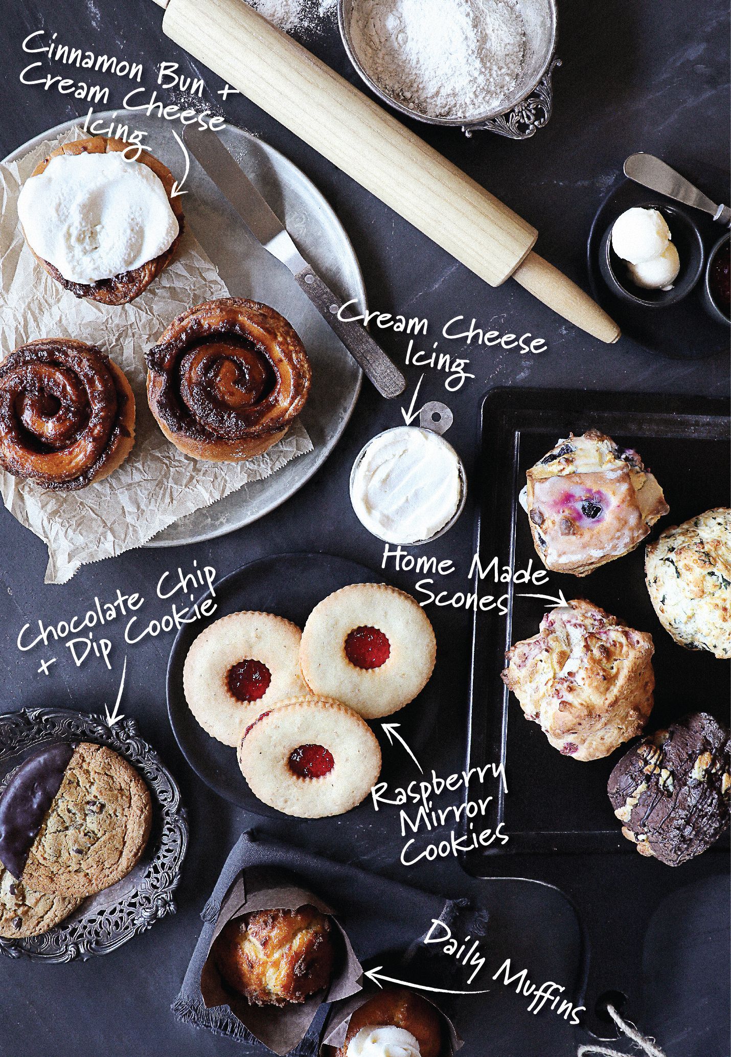 A table topped with a variety of baked goods and a rolling pin.