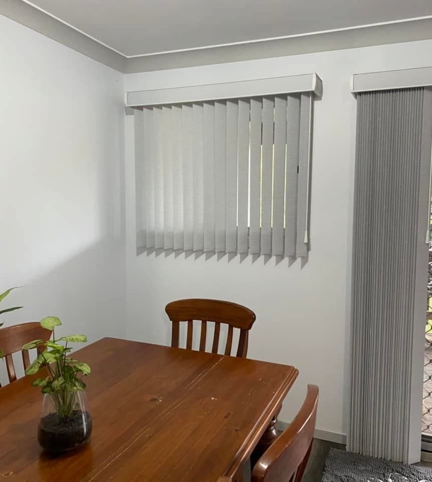 A Cozy Dining Room With a Wooden Table