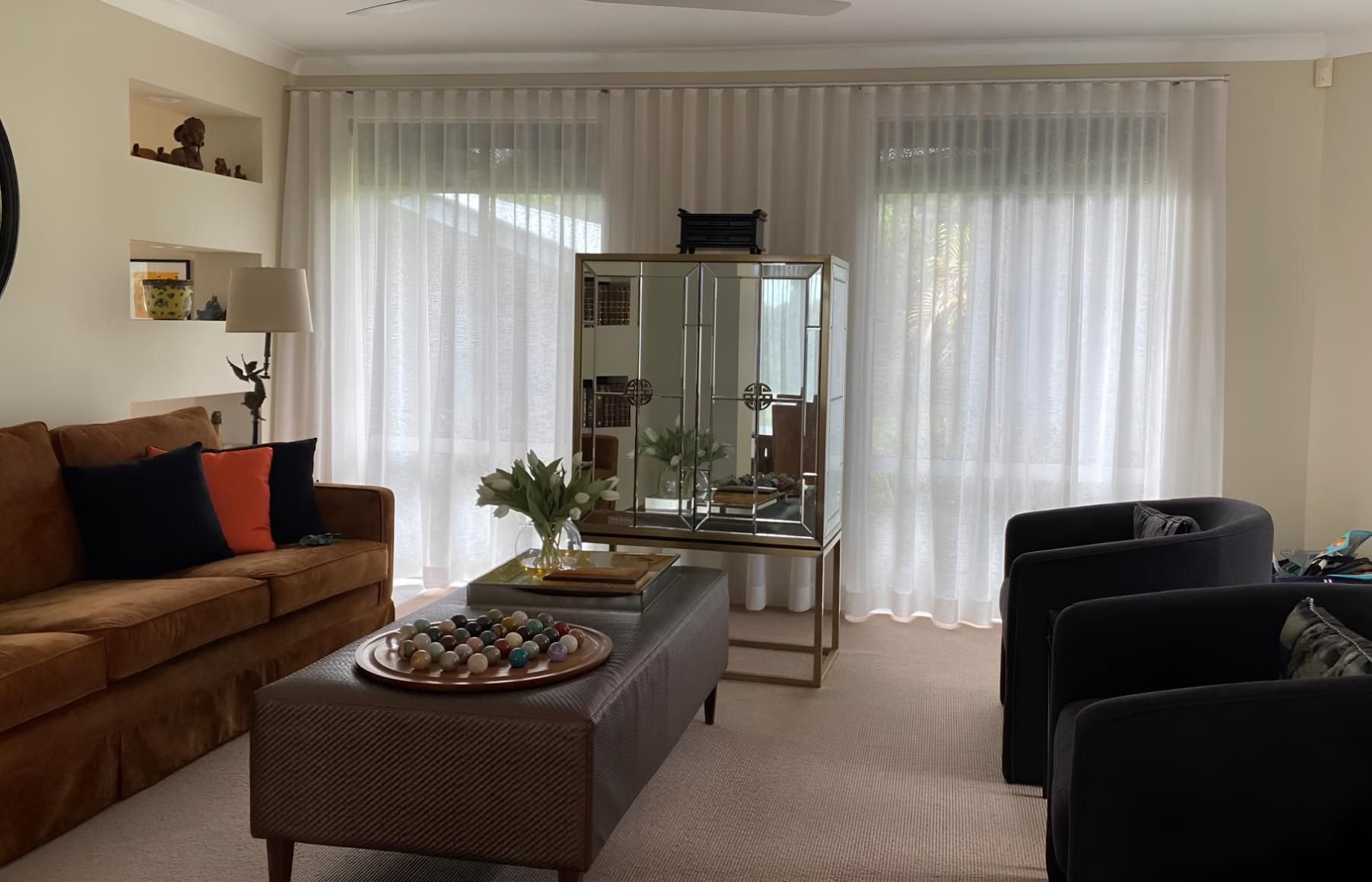 Living Room With a Couch, Chairs, Coffee Table and Curtains — Lismore Curtains & Blinds In Ballina, NSW
