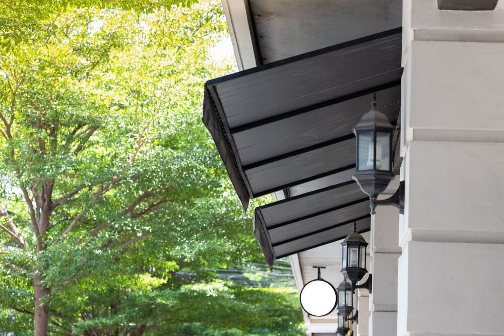 A Black Awning outside — Lismore Curtains & Blinds In Byron Bay, NSW